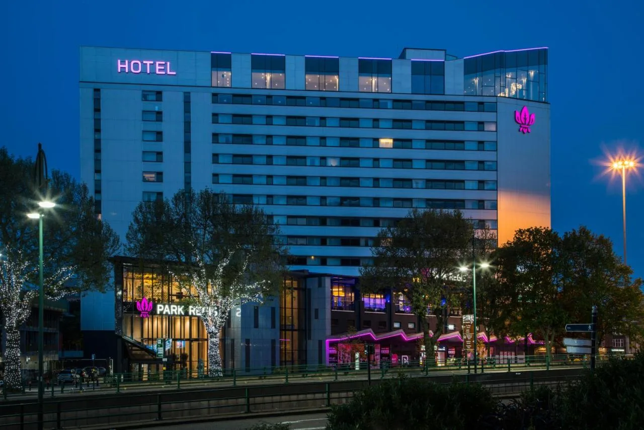 Park Regis Birmingham tower illuminated at night